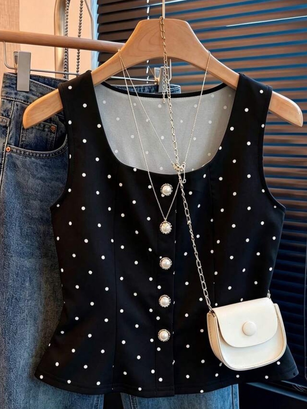 Sleeveless Black and White Polka Dot Button-Front Top